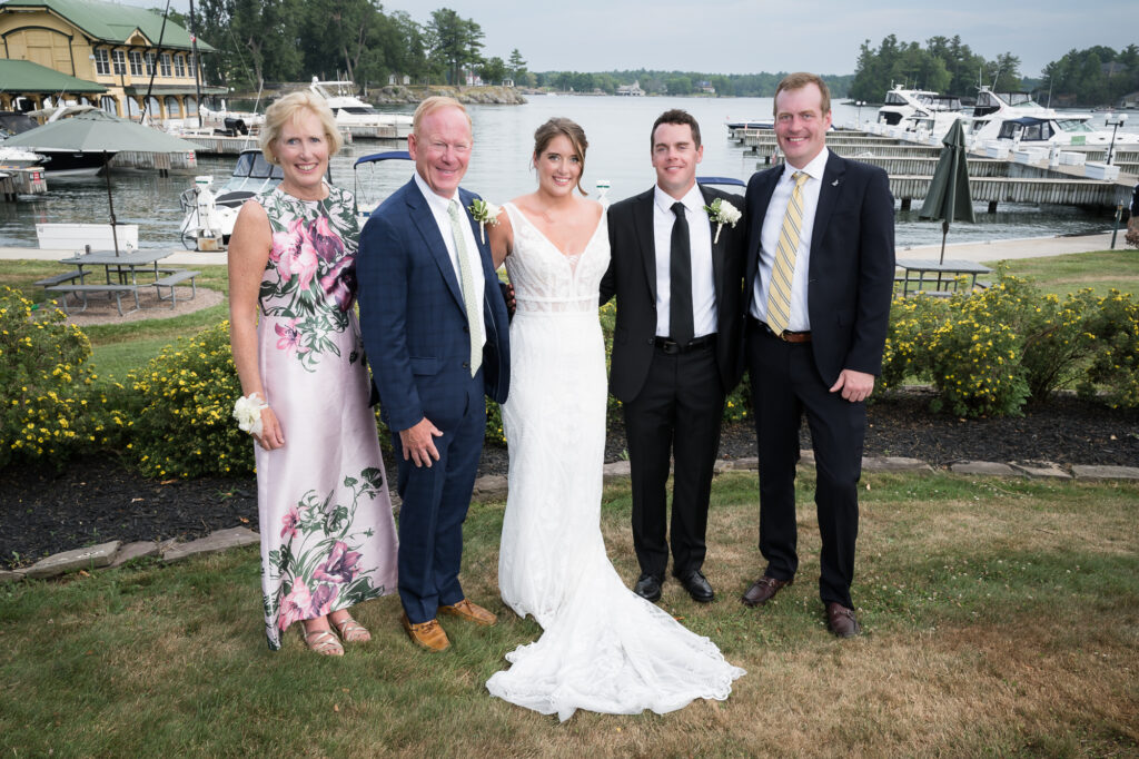 Photographers documenting a destination wedding at Thousand Islands Club on Wellesley Island near the Thousand Islands