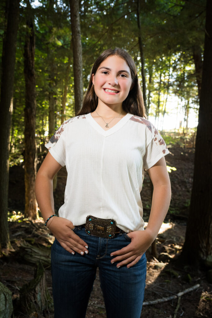 Northern NY senior photographer captures outdoor portraits of Canton High School senior Bella with her unique interests.