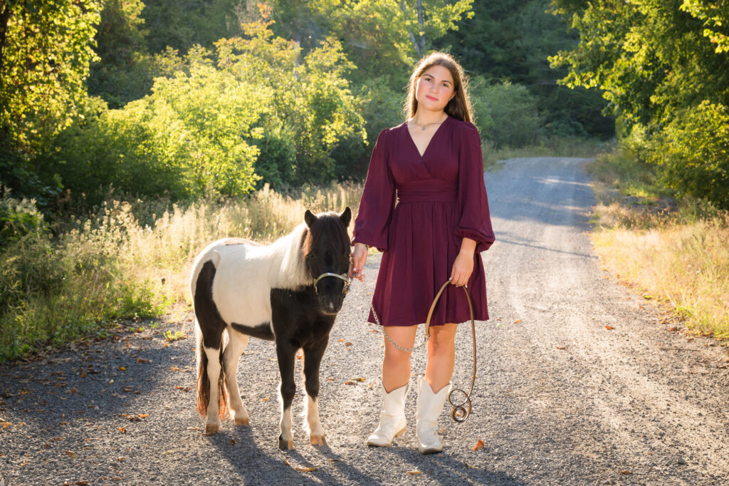 Canton NY senior portrait session featuring Bella and her miniature horse captured by a Northern NY photographer.