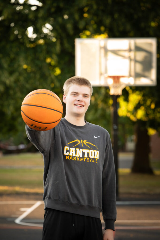 High school senior photographers in Canton NY capturing basketball portraits for Canton High School senior Ciaran